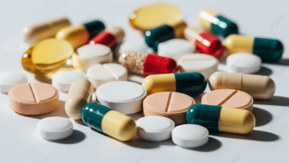 pngtree assorted medications and capsules on white surface image 21101886